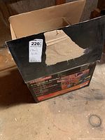 Box showing Craftsman 6-inch bench grinder label with some wear and tear.