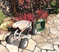 Photo showing all three items: garden buggy with metal pumpkin seat and wire basket, Scotts lawn seeder with green hopper, and metal bird feeder