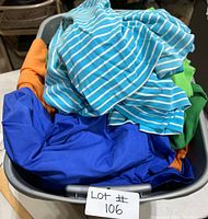 Bin of assorted men's shirts mostly polo style, various colors and sizes 2XL-3XL.