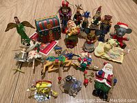 Full lot of assorted Christmas ornaments, variety of holiday characters and themed pieces.