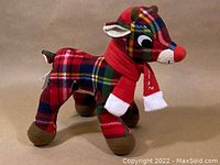 Front and side view of a colorful plaid plush Rudolph the Red-Nosed Reindeer showing red nose, brown hooves, and scarf.