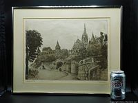 Framed etching showing the entire artwork with a size reference by a soda can, presenting a view of Budapest's Fisherman's Bastion monument in a light sepia tone.