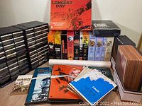 Overall overview of collection: game boxes, plastic counter drawers, folded map boards