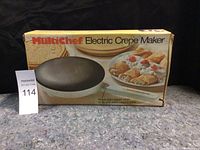 MultiChef Electric Crepe Maker in original box with product image and crepes shown on top