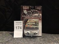 Front of original Hot Wheels Milestone Moments Hall of Fame Mustang packaging showing the miniature model inside blister pack headed by Milestone Moments branding.