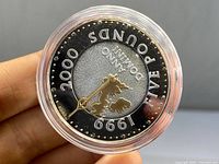 Reverse of coin showing Falkland Islands map and denomination Five Pounds with date 1999