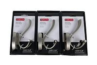 Three new Delta Dansant hooks in satin nickel finish in original retail packaging, showing front view
