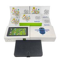 Seven boxed Android tablets with keyboard cases in packaging, showing Android logos and colorful app icon designs on the boxes.