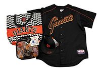 Photo showing full lot arranged on white background: Giants jersey, tote bag, SnapBack hat, Buster Posey lunch bag with tags visible in packaging.