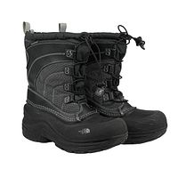 Side angled view of the black North Face boys' insulated snow boots with lace-up front and reinforced sole and toe.
