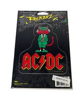 Front of original packaging showing the AC/DC decal in Rockerz branding with cartoon devil character.