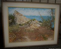 Framed oil painting depicting a Barbados seascape with rocky cliffs, trees, and ocean, signed by Victor Collector.