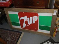 Front view of full framed sign leaning against furniture