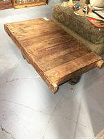 Angled view of full wooden deck and wheels