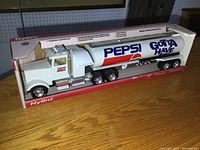 Wide shot of the boxed Nylint Pepsi Tractor Trailer showing full length and packaging condition.