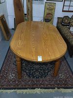 Full top view of the solid oak dining table showing wood grain and size.