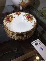 Stack of 8 Royal Albert Old Country Roses cereal bowls showing floral pattern and gold rim.
