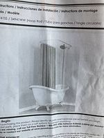 Photo of installation instructions showing circular hoop rod around clawfoot tub with shower curtain