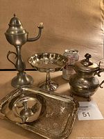 Photo showing the entire set, including the tall pewter lamp, silver plated candy dish, sauce boat, and serving tray with a soda can for size reference.