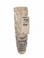Front view of tall clear wavy textured crystal vase with inventory sticker