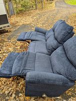 Front view with both end seats reclined showing extended footrests
