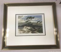 Framed art print titled “White Pines” by A. J. Casson displayed on a flat surface, showing the full frame and matting.