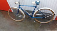 Full left-side view of bicycle showing frame, fenders, drivetrain and saddle
