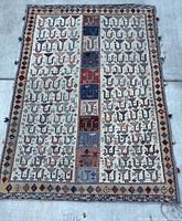 Top-down view of entire rug on concrete floor.