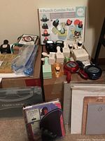 Overview of crafting punches and rubber stamps including combo punch pack and various hand punches in different shapes and sizes