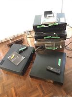 Overview of six media devices on floor