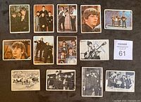 Front side of 13 Beatles collectible cards from the 1960s showing various images of the band members in color and black & white.
