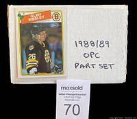 White cardboard box with handwritten label '1988/89 OPC PART SET' and a Glen Wesley hockey card in front.