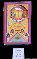 Purple box front with NBA Basketball 91-92 Edition logo, showing 12 cards per pack, tamper-resistant pack, and 3-D holograms info.
