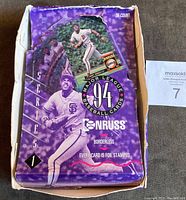 Top view of the partially opened 1994 Donruss baseball card wax box showing the purple series 1 design with images of baseball players.