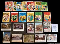 Top-down view of 22 My Funny Valentine cards with colorful humorous valentine messages from 1961 layered in rows.
