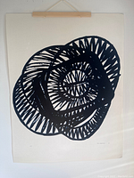 Full view of the signed abstract print showing the intricate black circular brush stroke design on an off-white background.