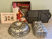Overview photo showing all baking pans and decorating books arranged together