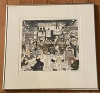 Full view of framed cafe scene print showing the entire artwork and frame.
