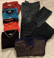 Full view of all clothing items including 4 casual tops, silk dress shirt, 2 pairs of jeans