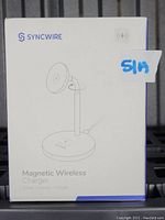 Front view of unopened Syncwire Magnetic Wireless Charger box showing product illustration and branding.
