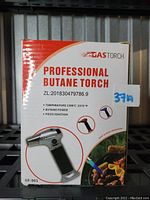 Front of the product box with model number GF-901, branding, and features listed (temperature, butane power, piezo ignition).