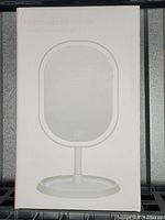 Photo of the product box front showing the LED makeup mirror design.