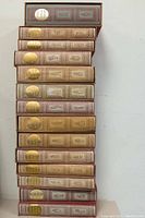 Full stack of 14 Dickens volumes in red slipcases