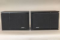 Front view showing both BOSE Series 201-Series III speakers with intact fabric grills and BOSE logos visible.