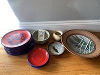 Overview of all ceramic plates and bowls showing color and styles