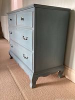 Three-quarter view showing overall dresser and finish