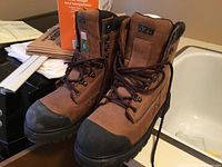 Front view of Dakota 529 brown insulated work boots with black toe caps and laces.