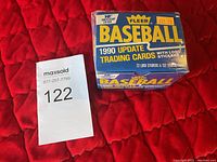 Photo of the sealed 1990 Fleer Baseball Trading Cards box with branding and text visible.