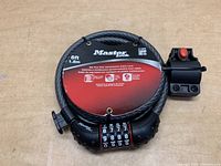 Front view of the 6ft Master Lock combination cable bicycle lock showing the brand label and the combination mechanism.