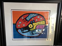 Full view of framed print showing overall condition and frame style